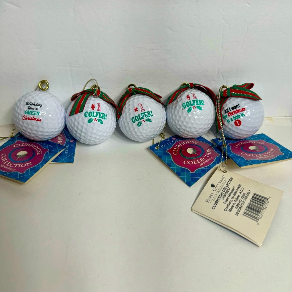 NWT. 5 golf ball ornaments. 4 out of 5 have little bows. Writing on each ball